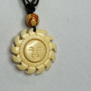 Genuine Ivory Bone Hand Carved Sun pendant